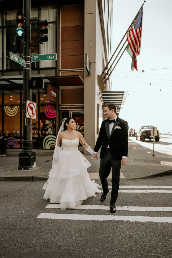 Bride and Groom walk through the streets of downtown Seattle