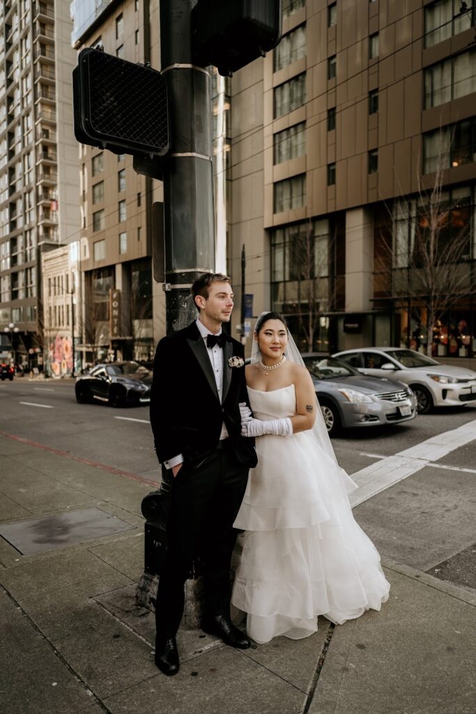Bride and Groom walk through the streets of downtown Seattle