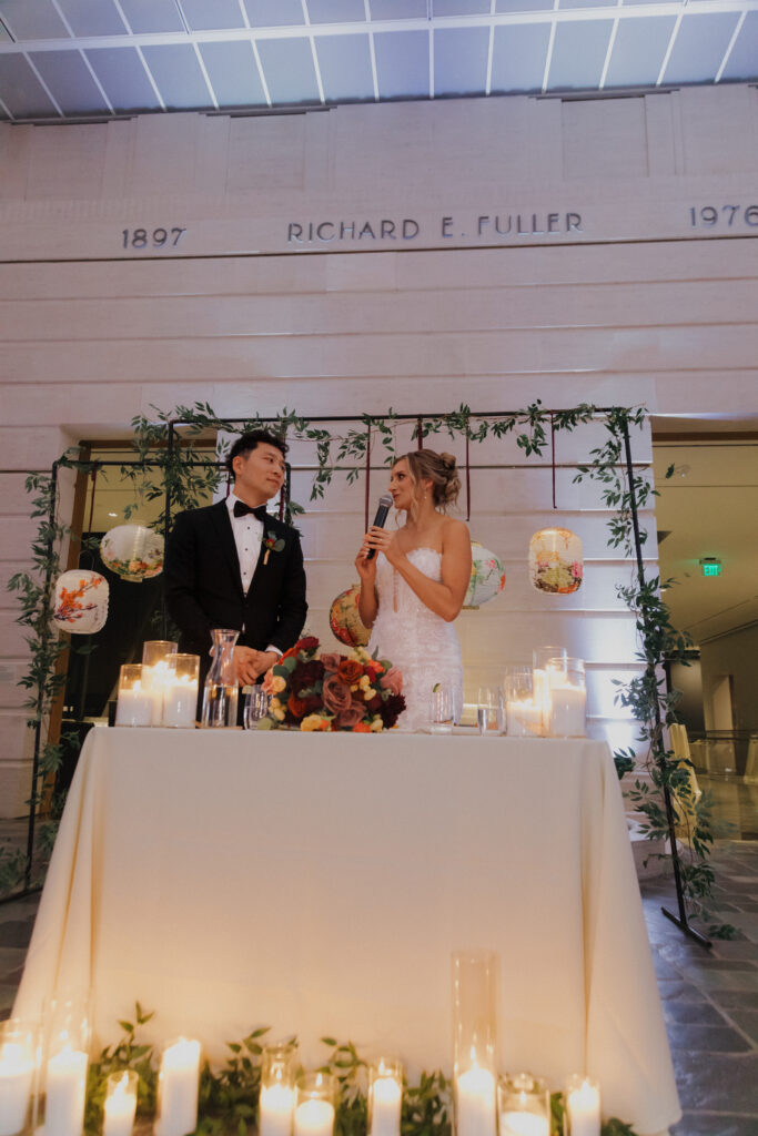 Couple giving a toast at Seattle Asian Art Museum