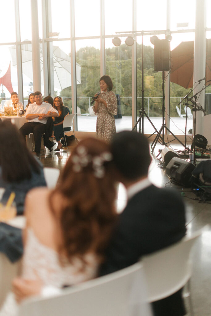 Couple listening to a toast at the Olympic Sculpture Park in Seattle 